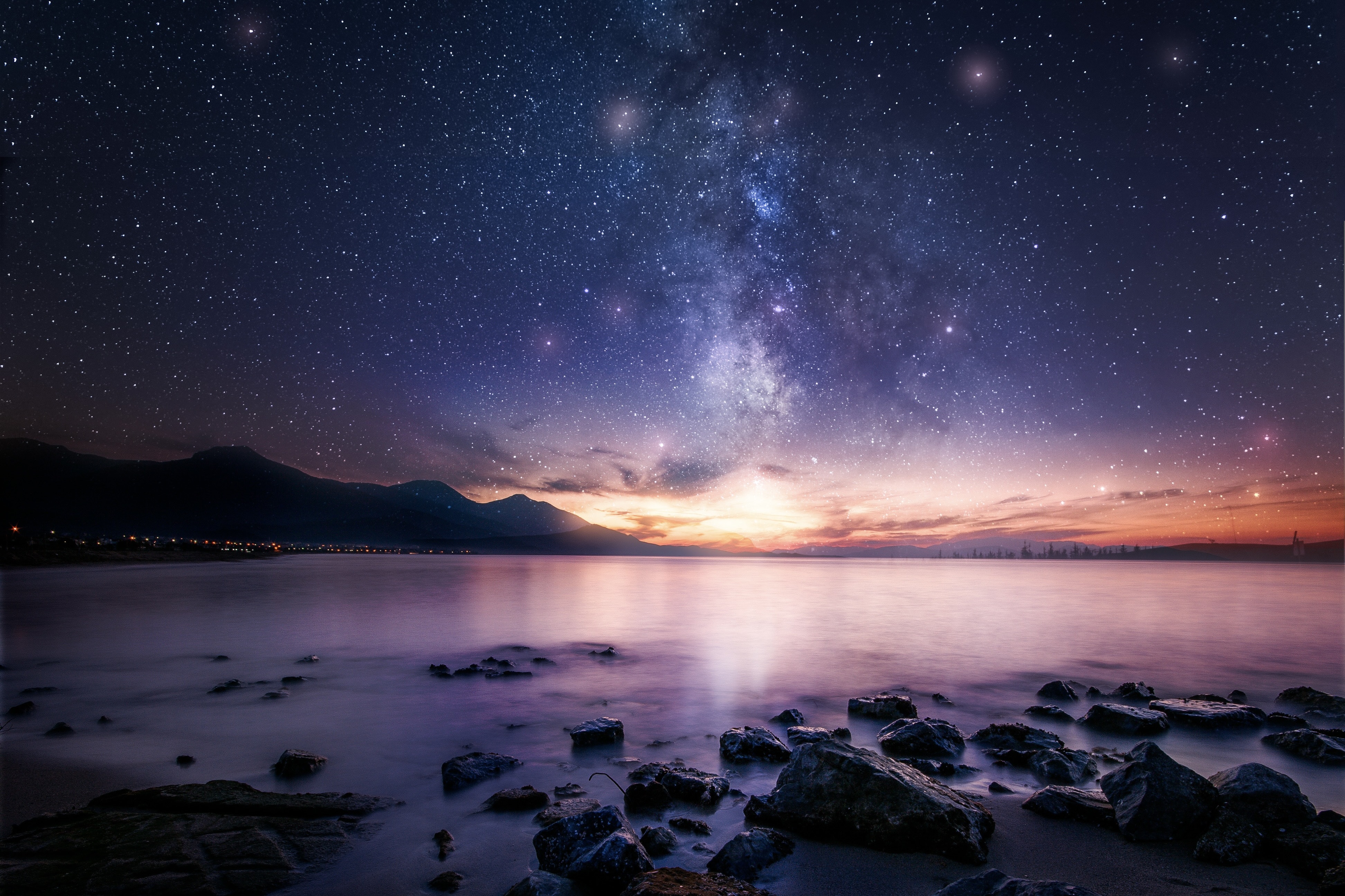 Starry sky over an ocean.